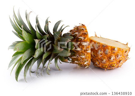 Pineapple slices with leaves isolated on a white background 136438910