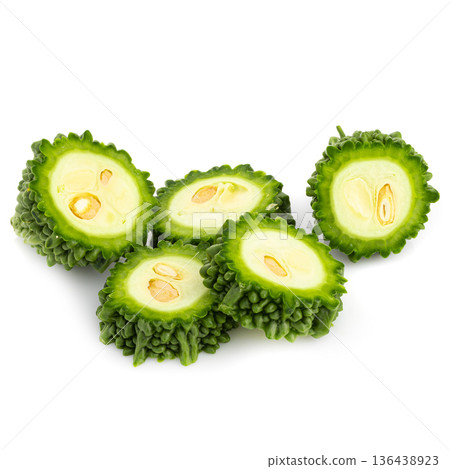 Fresh bitter gourd Bitter cucumber or bitter melon with cut slice isolated on a white background. Fresh bitter gourd Bitter cucumber or bitter melon with cut slice isolated on a white background. 136438923