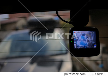 Drive recorder mounted on the rear window Drive recorder mounted on the rear window 136438948