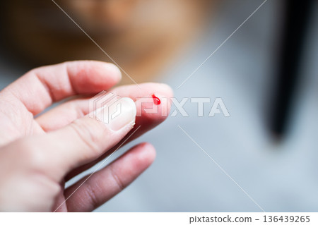 Detailed medical imaging. Precise depiction of blood test with careful hand positioning Detailed medical imaging. Precise depiction of blood test with careful hand positioning 136439265