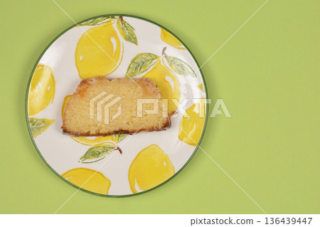 Slice of lemon cake on a decorative plate Slice of lemon cake on a decorative plate 136439447