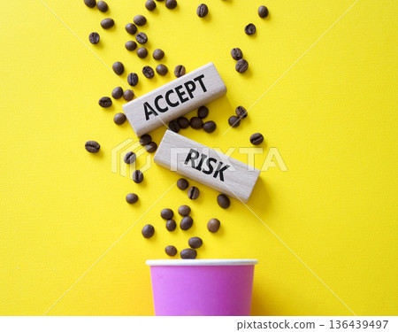Accept Risks symbol. Concept words Accept Risks on beautiful wooden picture frame. Beautiful yellow background with coffee cup and coffee beans. Business and Accept Risks concept. Copy space. Accept Risks symbol. Concept words Accept Risks on beautiful wooden picture frame. Beautiful yellow background with coffee cup and coffee beans. Business and Accept Risks concept. Copy space. 136439497