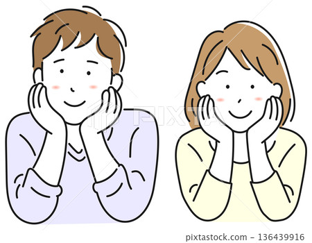 A young couple resting their chins on their hands A young couple resting their chins on their hands 136439916