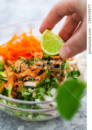 Chinese style squid, cucumber, carrot and cilantro fresh salad Chinese style squid, cucumber, carrot and cilantro fresh salad 136439977
