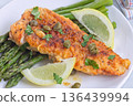Delicious haddock fish piccata, battered fish fillet with capers, lemon and asparagus, horizontal 136439994