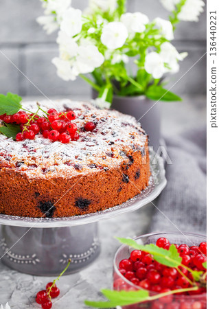 Homemade fresh baked delicious coconut and red currant coffee cake 136440221