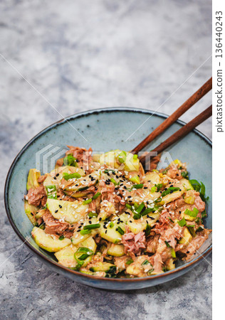 Asian style protein tuna cucmbers and green onion fresh salad 136440243
