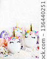 Easter eggs in the form of a unicorn on white background, copy space for text, close-up 136440251