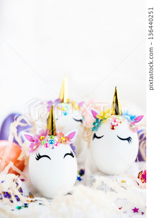 Easter eggs in the form of a unicorn on white background, copy space for text, close-up Easter eggs in the form of a unicorn on white background, copy space for text, close-up 136440251