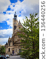 View of beautiful architecture and trees on summer streets in the city center of Paris, France 136440256