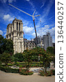 View of beautiful architecture and trees on summer streets in the city center of Paris, France 136440257