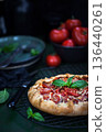 Delicious homemade rustic tomato and cheese open pie (galette) 136440261