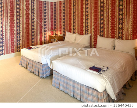 Twin room with retro wallpaper Unmanned hotel room 136440433