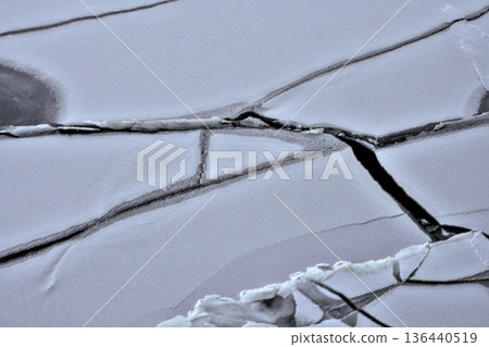 Ice Fragments Shimmer. Chilly Sea Ice Breaks Into Mosaic Structures Ice Fragments Shimmer. Chilly Sea Ice Breaks Into Mosaic Structures 136440519