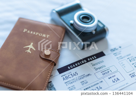 Prepare for your trip with your passport and camera. Photo courtesy of Kansai International Airport (KIX) 136441104