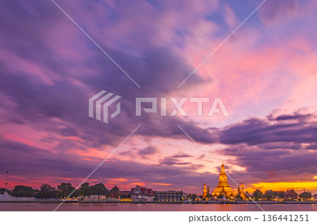 Twilight view of Wat Arun Ratchawararam Ratchawaramahawihan at sunset in bangkok Thailand. Landmark of Along the Chao Phraya River Thailand 136441251