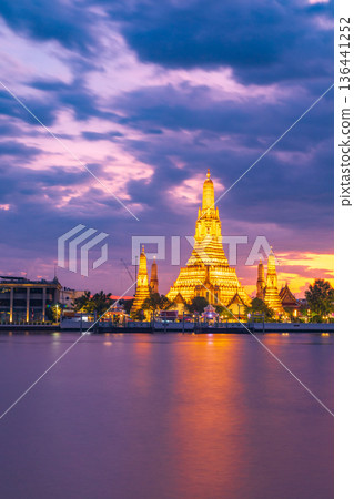 Twilight view of Wat Arun Ratchawararam Ratchawaramahawihan at sunset in bangkok Thailand. Landmark of Along the Chao Phraya River Thailand 136441252