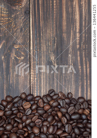 close up coffee beans on wooden background, top view, copyspace close up coffee beans on wooden background, top view, copyspace 136441255