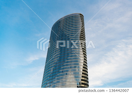 New York City, USA - May 26, 2024: Ellipse at Newport glassy skyscraper building architecture. Skyscraper of Westin glass building. Skyscraper building architecture in perspective view New York City, USA - May 26, 2024: Ellipse at Newport glassy skyscraper building architecture. Skyscraper of Westin glass building. Skyscraper building architecture in perspective view 136442007