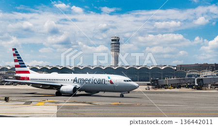 Washington DC, USA - June 04, 2024: Departure and arrival at airport. American aviation airline. Airport terminal and runway strip. Aviation. Plane arrival of American airline. Airport parking 136442011