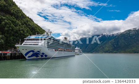 Skagway, Alaska, USA - July 23, 2019: Travel destination. Island Princess of Princess cruises. Cruise ship vacation tour. Alaska harbor and cruise liner ship. Travel vacation tour. Tour advertisement Skagway, Alaska, USA - July 23, 2019: Travel destination. Island Princess of Princess cruises. Cruise ship vacation tour. Alaska harbor and cruise liner ship. Travel vacation tour. Tour advertisement 136442033