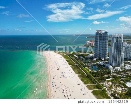 City skyscraper architecture and marina. Cityscape skyline of Miami, Florida. Architecture of city. City downtown skyline. Skyline of Miami. Miami south beach aerial view. Travel destination City skyscraper architecture and marina. Cityscape skyline of Miami, Florida. Architecture of city. City downtown skyline. Skyline of Miami. Miami south beach aerial view. Travel destination 136442219