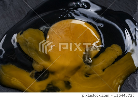 Raw broken egg texture Raw broken egg texture 136443725