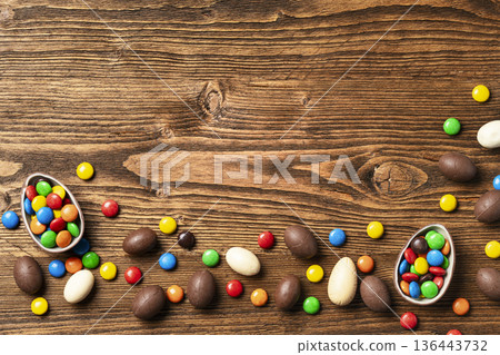 Colorful Easter sweets on rustic wooden table Colorful Easter sweets on rustic wooden table 136443732