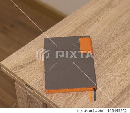 Bright, fancy notebook on the table 136443852