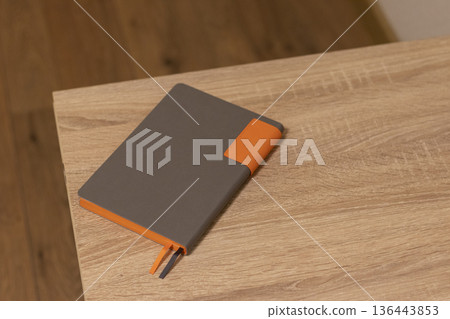 Bright, fancy notebook on the table 136443853