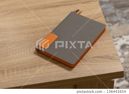 Bright, fancy notebook on the table Bright, fancy notebook on the table 136443854