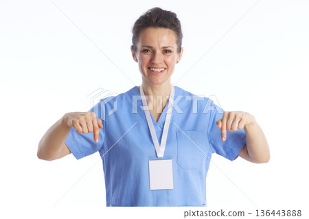 Professional Medical Staff Pointing Down for Promotion 136443888