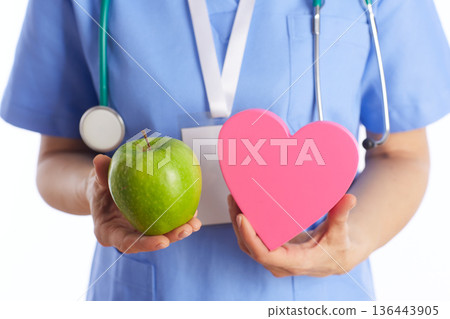 Medical Professional with Heart and Apple for Nutrition Medical Professional with Heart and Apple for Nutrition 136443905