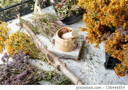 different wild medicinal dry herbs: white yarrow herb blossoming, yellow tansy herb, marjoram,  St. John's wort at white background 136444854