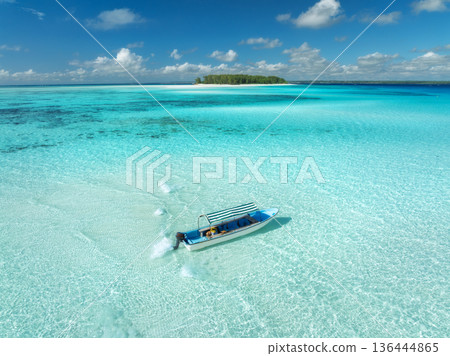 Aerial view of colorful boats, sandbank, blue sea on sunny day 136444865