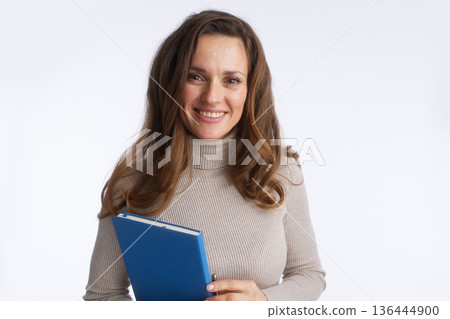 Friendly Specialist Holding Blue Folder and Pen Friendly Specialist Holding Blue Folder and Pen 136444900