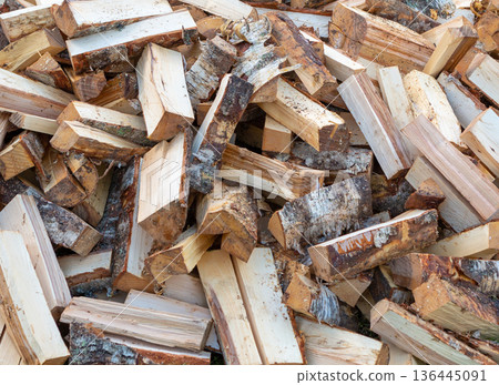 Firewood. Chopped pile of birch logs. Firewood. Chopped pile of birch logs. 136445091