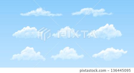 A set of white clouds of various shapes on an isolated blue background. A set of white clouds of various shapes on an isolated blue background. 136445095