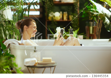 Modern Self-Care with Smartphone in Bathtub Modern Self-Care with Smartphone in Bathtub 136445354