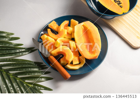 Papaya exotic fruits on plate. Healthy vegan food. 136445513