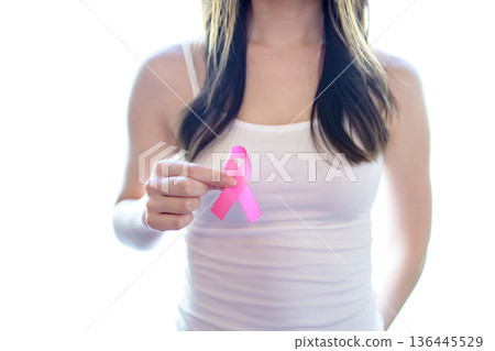 Woman holding a pink ribbon, breast cancer screening, early detection, recommended, image Woman holding a pink ribbon, breast cancer screening, early detection, recommended, image 136445529