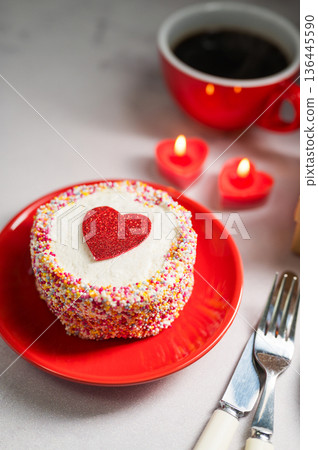 Valentine's Day or Mother's Day bento cake with red heart, cup of coffee and candles. Copy space Valentine's Day or Mother's Day bento cake with red heart, cup of coffee and candles. Copy space 136445590