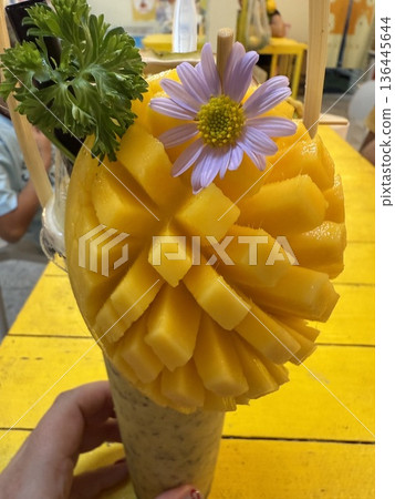 Fresh Mango Smoothie in Decorative Mango Cup Fresh Mango Smoothie in Decorative Mango Cup 136445644