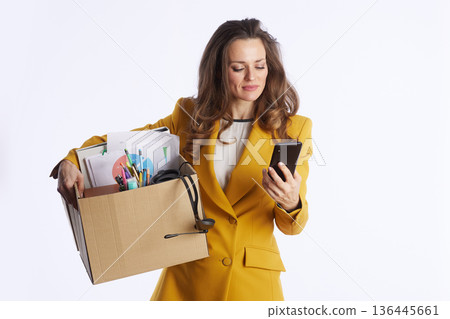 Professional Woman Checking Phone During Transition 136445661