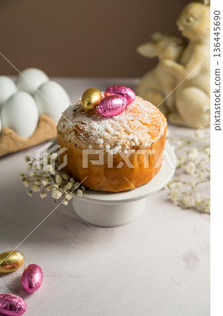 Easter cake with chocolate easter eggs, gypsophila flowers and cute bunnies. Spring holiday background. Easter cake with chocolate easter eggs, gypsophila flowers and cute bunnies. Spring holiday background. 136445690