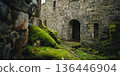Rustic medieval stone castle wall background with aged moss-covered bricks. 136446904