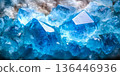 Ethereal glowing blue crystal stone background with mystical, translucent layers. 136446936