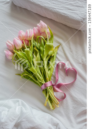 Pink Tulip Bouquet on White Bed Medium Shot Pink Tulip Bouquet on White Bed Medium Shot 136447189