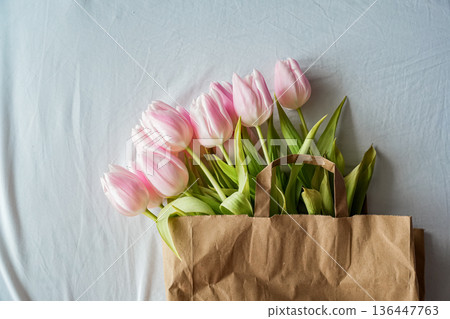 Horizontal View of Pink Tulips in Paper Bag 136447763