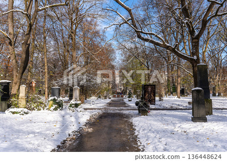 Winter view of famous Old North Cemetery of Munich, Germany with historic gravestones. Winter view of famous Old North Cemetery of Munich, Germany with historic gravestones. 136448624